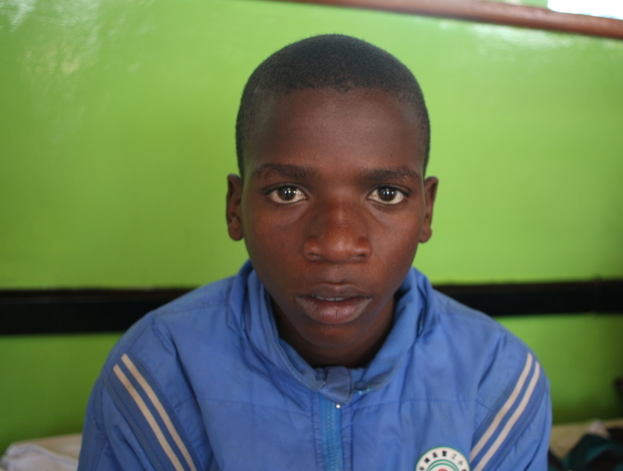 John is a teenager from Kenya who needs $799 to fund burn repair surgery.